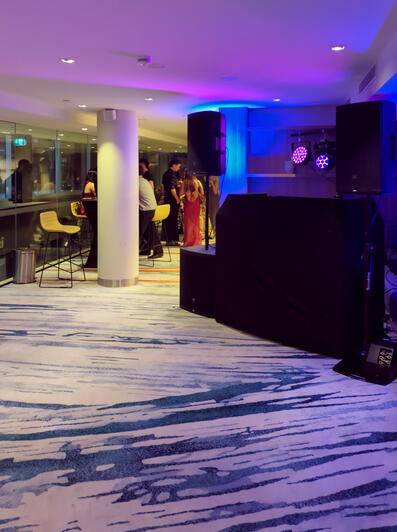 Reception dancefloor lighting setup Wedding DJ setup with Pioneer decks, JBL speakers and lighting